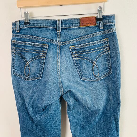 Calvin Klein Size S8 L32 Women's Mid Rise Flare Jeans Faded Blue Pockets - Picture 4 of 9